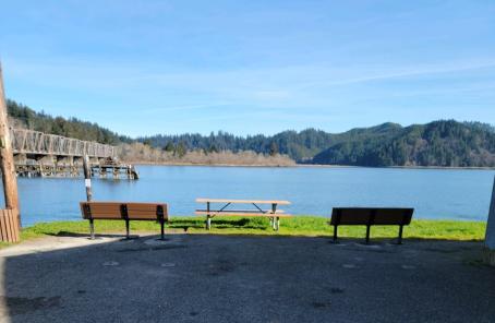 new benches and picnic table overlooking the river