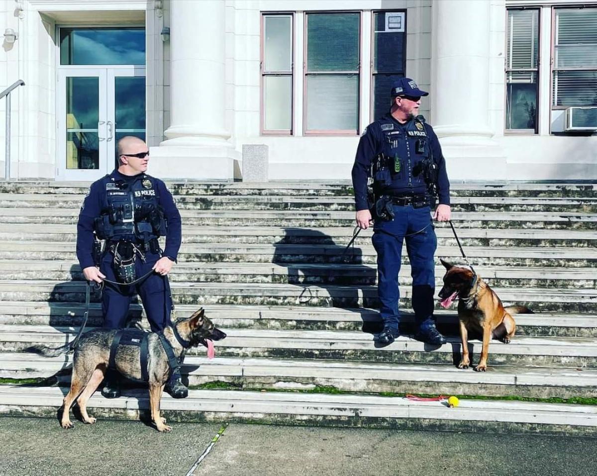 Cpl. Snyder, K9 Penny, Ofc. Wood and K9 Ferran